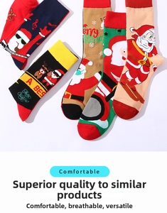 Flat lay of colorful knit Christmas crew socks featuring Santa and reindeer patterns