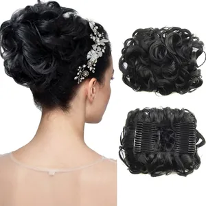 Detail showing the inner hair comb attachment and texture of the black curly hair bun