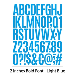 Detail showing 2-inch light blue bold letter and number stickers for planners