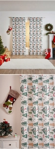 Detail of thick polyester Christmas tree print fabric with festive starry pattern texture