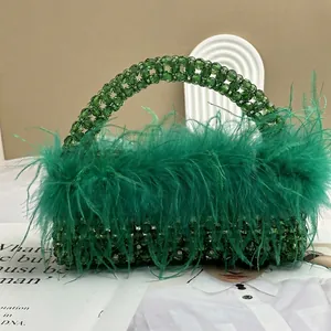 Elegant emerald green handmade beaded handbag with ostrich feather trim for parties