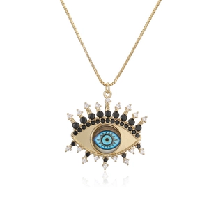 Collier mauvais œil doré avec émail bleu et cristaux incrustés pour femme