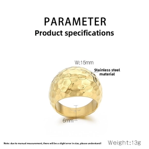 Close-up of hammered 316L stainless steel ring showing 15mm gold finish band