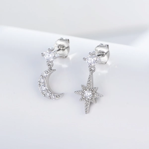Asymmetric S925 sterling silver star and moon stud earrings with sparkling cubic zirconia