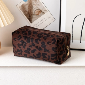 Leopard print makeup bag with gold zipper for women's travel organization