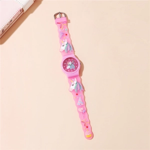 Detail of the pink 3D silicone watch strap featuring unicorns and rainbow motifs