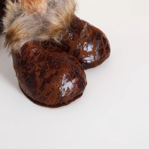 Nordic fabric Christmas reindeer doll with textured brown hooves and fluffy faux fur trim