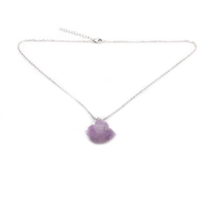 Close-up of purple crystal pendant with silver chain and adjustable lobster clasp