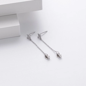 Detail of S925 sterling silver long tassel earrings with sparkling zircon flower stud