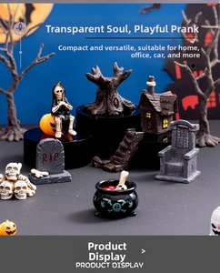 Detailed view of Halloween resin miniatures set with grim reaper, cauldron, and RIP tombstone