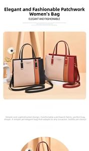 Detail view of contrast color tote bag with sturdy handles and metal hardware accents