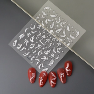 Elegant white bowknot and star nail art stickers with small rhinestones on red nails