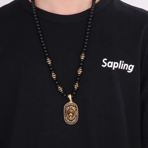 Men's retro lion head pendant necklace with black beads and gold-tone spacers