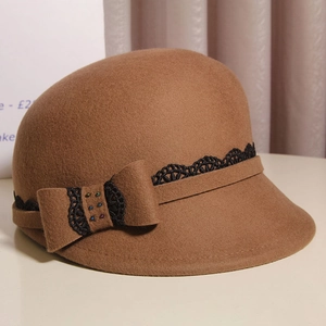 Elegant dark brown wool cloche hat with black lace band and colorful beaded bow accent