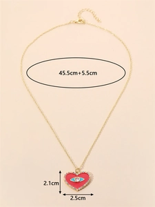 Détail du collier cœur doré avec pendentif œil protecteur rouge et ses dimensions