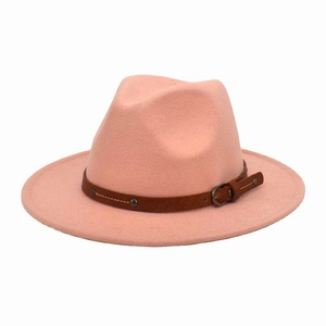 Detail of pink wool fedora with brown studded leather band and metal buckle accent