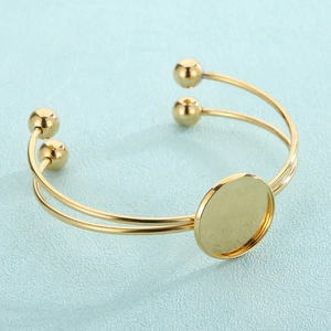 Bracelet jonc ouvert minimaliste en acier titane plaqué or avec double anneau et lunette ronde