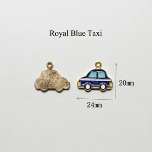 Macro view of blue enamel taxi charm showing front and back details with 24x20mm size