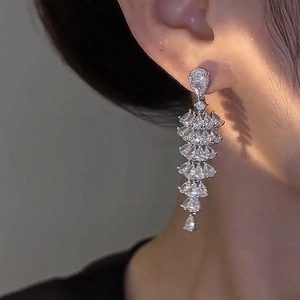 Elegant silver drop tassel earrings with sparkling zircon crystals for a luxury party look