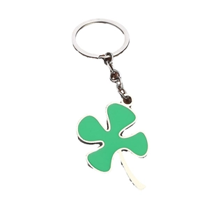 Lucky four-leaf clover keychain with green metal charm and silver-tone ring for car keys
