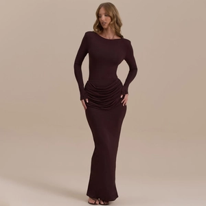 Full-length view of deep purple long-sleeve fishtail dress with elegant draping details
