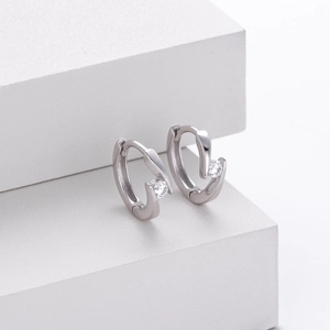 Detailed view of 925 silver lightning stud earrings with sparkling cubic zirconia stones