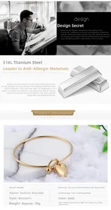 Detailed view of gold plated stainless steel bracelet with a polished heart pendant