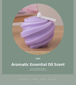 Detailed view of purple spiral scented candle with matte texture and minimalist paper label