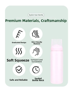 Pink hair dye squeeze bottle with comb applicator showing scale markings and soft texture