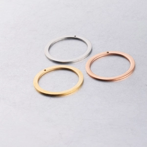 Polished 30mm round stainless steel circle pendants in gold, silver, and rose gold finishes