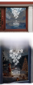 Detailed close-up of white snowflake Christmas tree window stickers with festive lettering