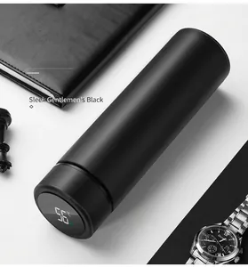 Matte black smart thermos detail with LED temperature display at 56 degrees Celsius