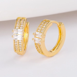 Chic gold hoop earrings featuring geometric oval design with dual clear zircon stones