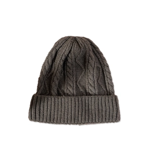 Close-up of the dark grey chunky knit beanie with diamond cable pattern and ribbed cuff