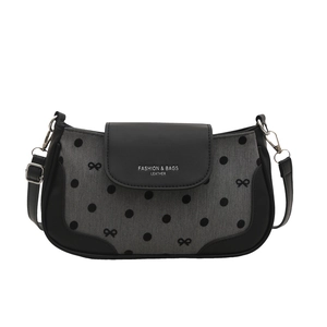 Sac bandoulière chic à pois noir et gris avec chaîne et design en patchwork de cuir