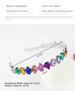 Detail of metal headband with gradient colorful acrylic rhinestones on a ceramic cup