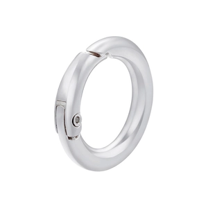 Detailed view of silver circular spring clasp for DIY jewelry and bag hardware