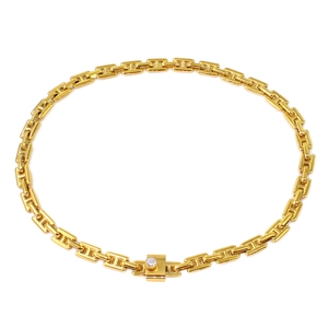 Detail of 18K gold plated stainless steel necklace with H-shaped links and gemstone clasp