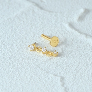 Detailed view of S925 sterling silver flat back earring with moon cubic zirconia stones