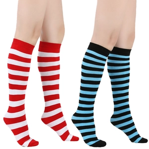 Detail of red-white and blue-black striped knee-high socks in a soft knit fabric