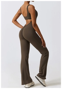 Detail of coffee-colored backless bodysuit with scrunch butt and flared leg cut