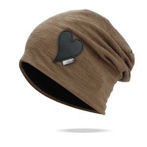Dark brown slouchy knit beanie with black heart leather patch and metallic detail