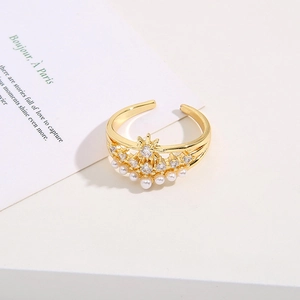Elegant gold crown open ring featuring a white round pearl and sparkling zircon crystals