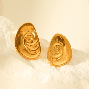 Minimalist 18k gold stainless steel conch earrings with spiral texture on white rock