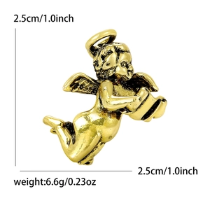 Vintage gold alloy angel brooch for clothes with size and weight dimensions shown