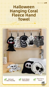 Close-up of soft coral fleece Halloween hand towels with spider web and bat patterns