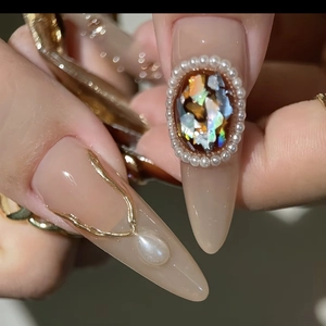 Luxury almond-shaped press-on nails with golden wire, pearls and shell mosaic inlay