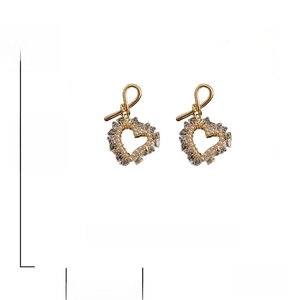 Detail showing 925 silver needle earrings with heart crystal and pearl inlay dimensions