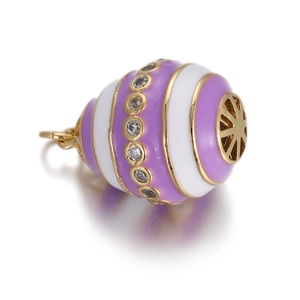 Macro detail of purple and white enamel eye pendant with sparkling cubic zirconia inlay