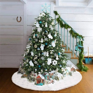 White faux fur Christmas tree skirt with snowflake embroidery and holiday decorations